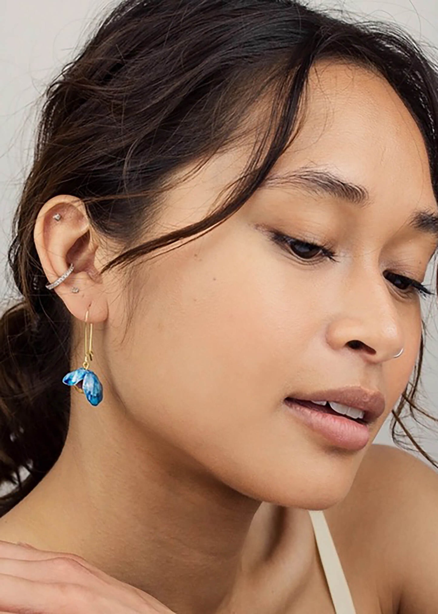 Lady wearing bluebell earrings