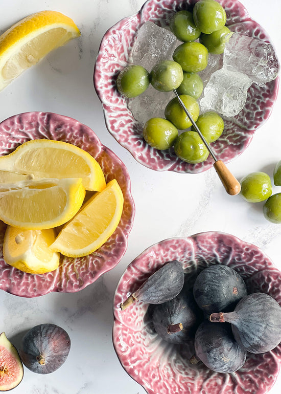 Ceramic Purple Cabbage bowls holding lemons, figs and olives